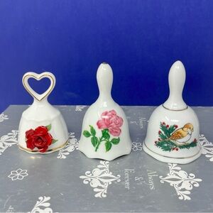 Set of Three Decorative White Bells with Floral and Bird Designs